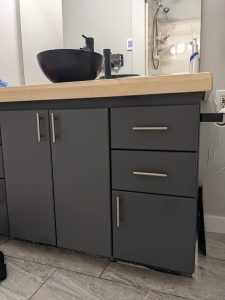 Replacement cabinet door fronts and drawer fronts in the Architect panel profile are featured in bathroom vanity. The door style is 2001 with #4 edge profile.