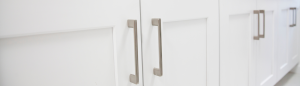 close-up White Kitchen Cabinet Doors with silver hardware