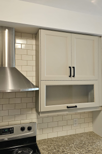 Blue Kitchens Refacing gave TDM's Nouveau Shaker a modern flair with a matte finish in Turmalin.