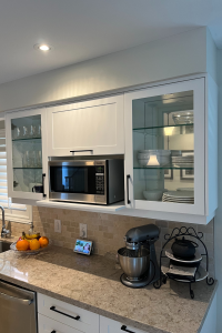 TDM's Inca cabinet door in style 2002 with a 7-edge profile finished in Snow White. By Blue Kitchens Refacing