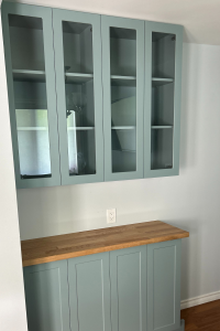 1 Lite mullions and frames, custom cabinet door fronts and panels are all featured in Vermont Shaker panel profile, style 2002, with a 7-edge, in the color finish Fjord.